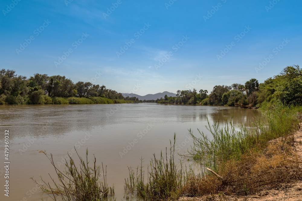 Fototapeta premium Landscape at the Kunene River, border rivers of Namibia and Angola, Epupa, Namibia