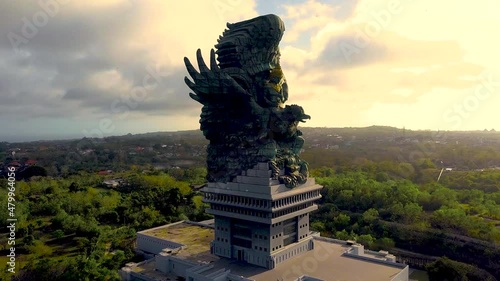 Drone footage of Garuda Wisnu Kencana, Uluwatu, Nusa Dua, Bali when Sunset photo