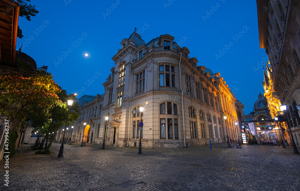 Fototapeta premium Landmarks of Bucharest. Historical buildings from the Old Town photographed during the night. Romania, 2021.