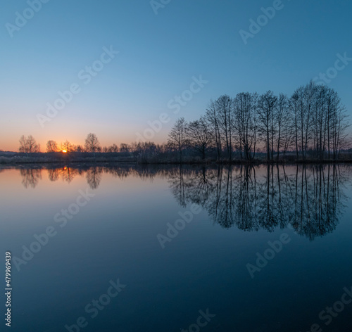 beautiful sunset on the lake © Александр Мороков