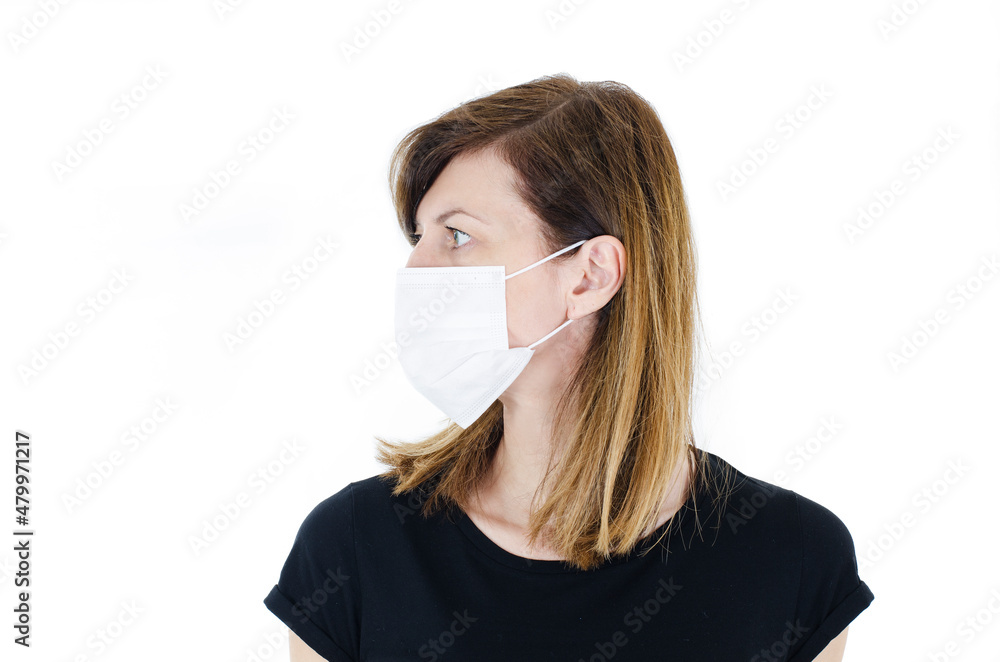 Side view of beautiful woman wearing medical face mask because of air, isolated on white background, copy space. Woman social distancing from corona virus covid-19. Studio shot, Side view of beautiful woman wearing medical face mask because of air, isolated on white background, copy space. Woman social distancing from corona virus covid-19. Studio shot,