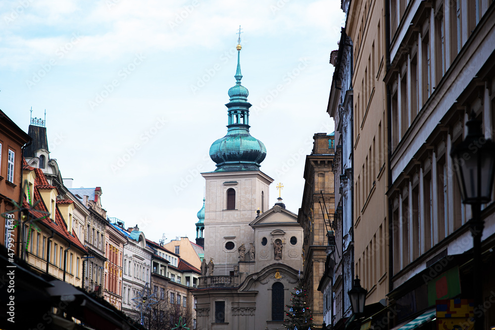 Naklejka premium Tourist street in a picturesque section of Old Town Prague, Czech Republic.