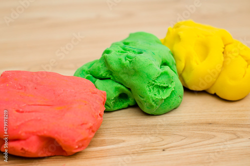 3 pieces of play dough . Lithuanian flag colors, independence day theme photo