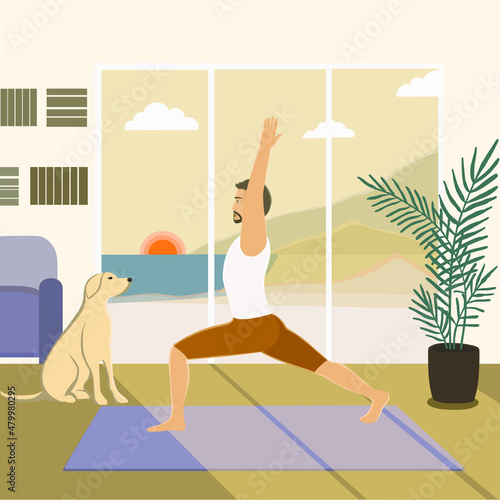 European appearance man practicing yoga at home, standing in Warrior I or Virabhadrasana 1 pose