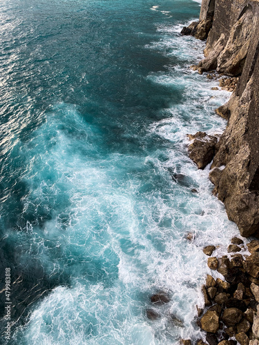 waves crashing on rocks