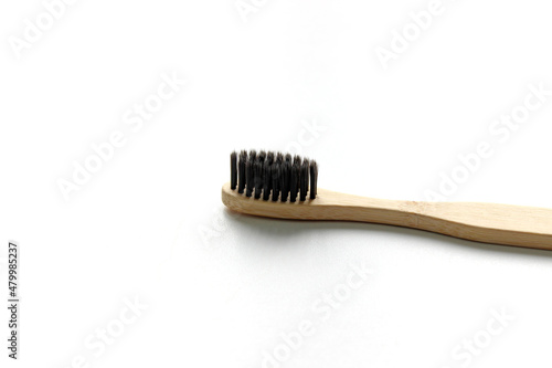 Eco-friendly bamboo toothbrushes on white background. Flat lay  top view  copy space