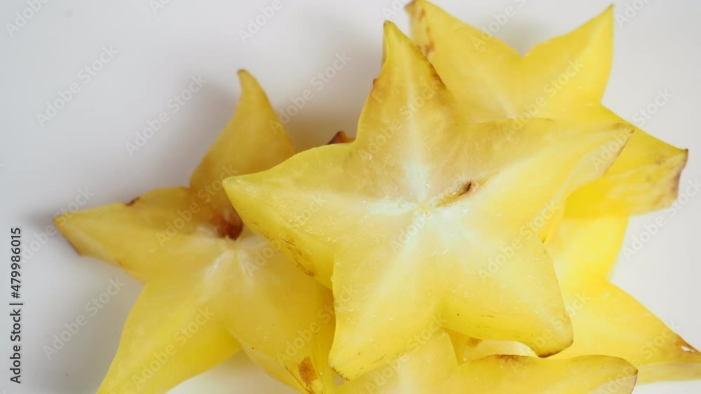 Averrhoa carambola,Star fruit, starfruit or star apple rotates on a white background Averrhoa carambola,Star fruit, starfruit or star apple rotates on a white background