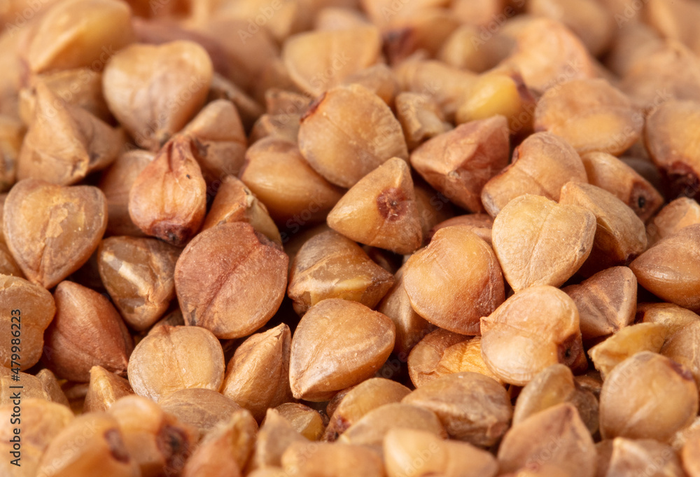 Close-up of buckwheat groats as background. Close-up of buckwheat groats as background.