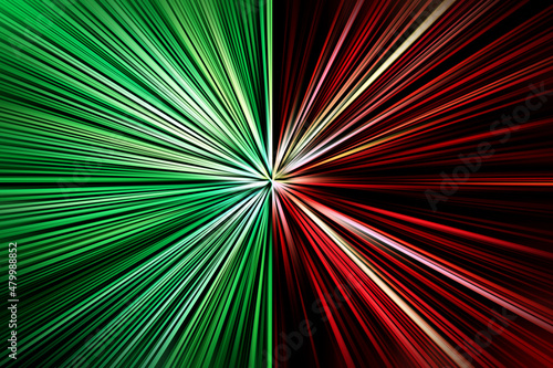 Abstract surface of blur radial zoom in green, red, black and white tones . Bright green red background with radial, diverging, converging lines. Bicolor background 