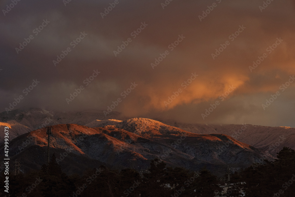 Naklejka premium sunset in the mountains