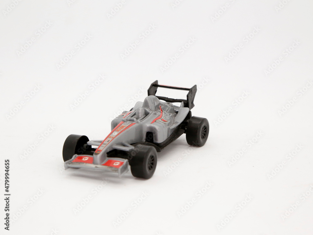 Formula 1 race car. Toy vehicle. Generic car. Isolated. Toy for children. Fast car.