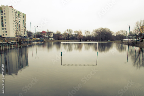 Ruined Football Pitch Drowned under Water after Heavy Rain. © Motionstocks