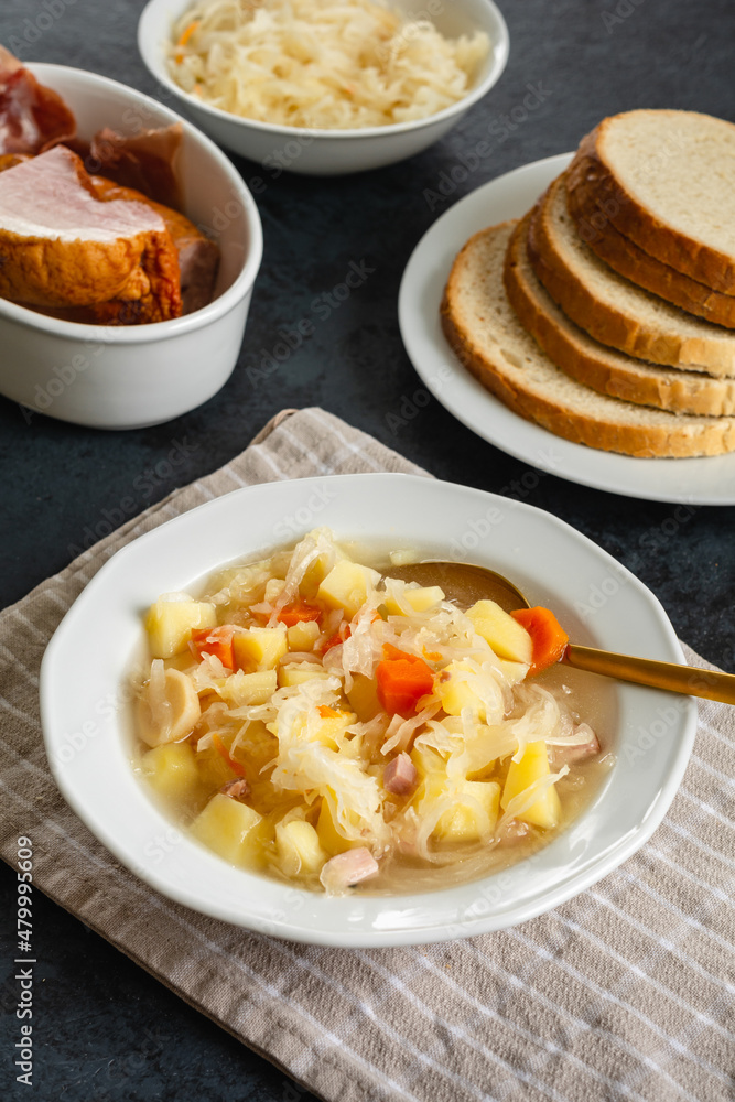 Sauerkraut soup with potatoes and carrots