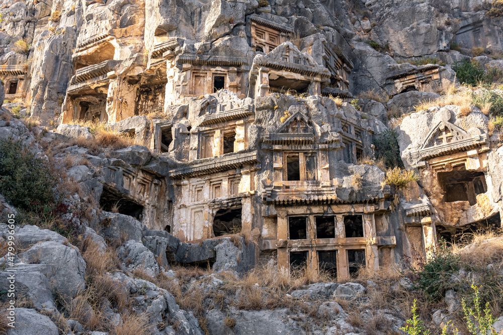 ancient tombs carved into the rocks in the ruins of Myra