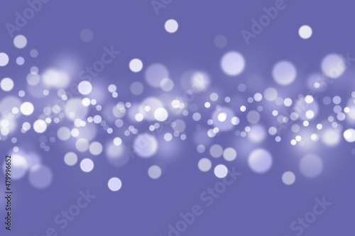 Abstract background of color year 2022 very peri with bokeh lights. Colorful bokeh glow sparkle with beautiful Valentine's Day concept. New Year