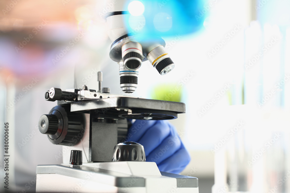 Fototapeta premium Microscope in laboratory for study of biology and chemistry