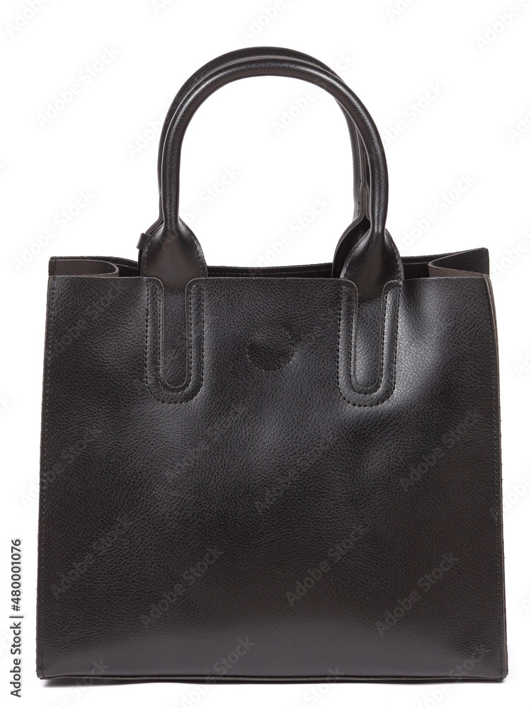 Black large with strap leather woman's handbag isolated on white background Black large with strap leather woman's handbag isolated on white background