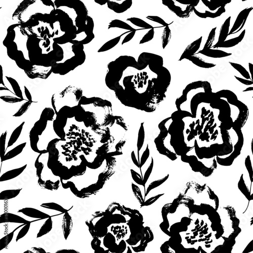Brush black loose leaves and flowers vector seamless pattern. Vintage floral ornament. Botanical vector pattern for design and prints. Hand drawn black paint ink illustration with abstract flowers