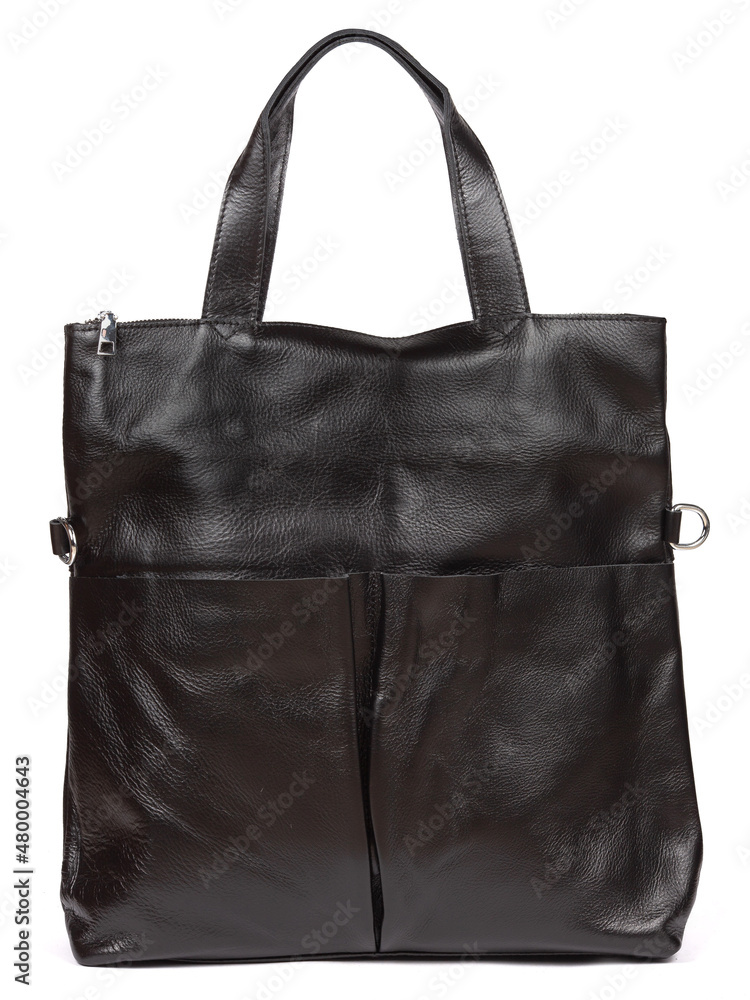 Black large with strap leather woman's handbag isolated on white background Black large with strap leather woman's handbag isolated on white background