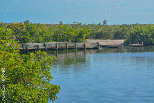 The boat launch and fishing pier in Round Island Riverside Park, on the Indian River, Vero Beach, Indian River County, Florida photo