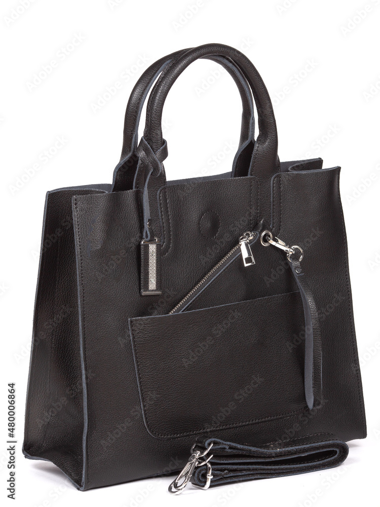 Naklejka premium Black large with strap leather woman's handbag isolated on white background