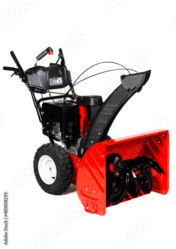 A red snow blower, snow thrower, snow removal equipment isolated on a white background. photo