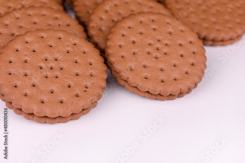Chocolate chip cookies with filling on white background.Copy space.