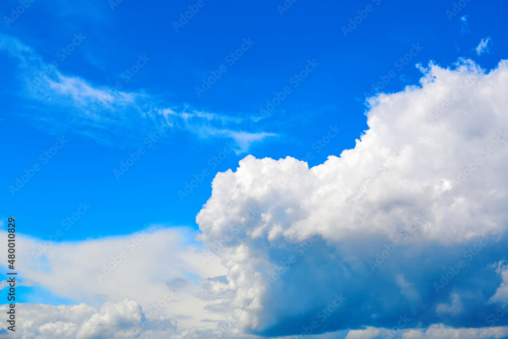 Obraz premium Blue sky with white cumulus clouds. Banner. Background. Nature wallpaper. Sunny weather forecast. Religion concept. Heaven landscape. Outdoor scenic. Bright pattern design. Copy space. Fresh air