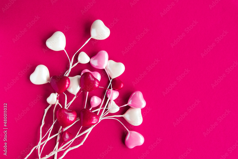 Valentine's day banner with many hearts on a red background with space for text.