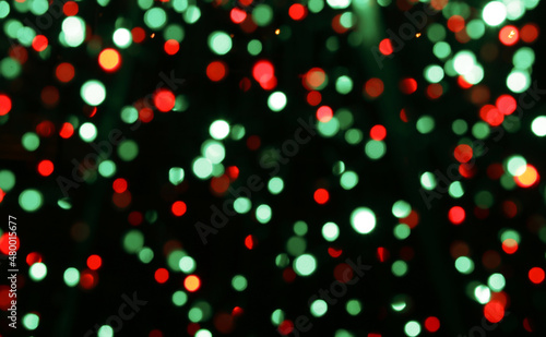 Abstract image of Christmas tree made of electric bulbs.