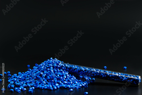 Blue granules of polypropylene, polyamide. Background. Plastic and polymer industry. Microplastic products.
