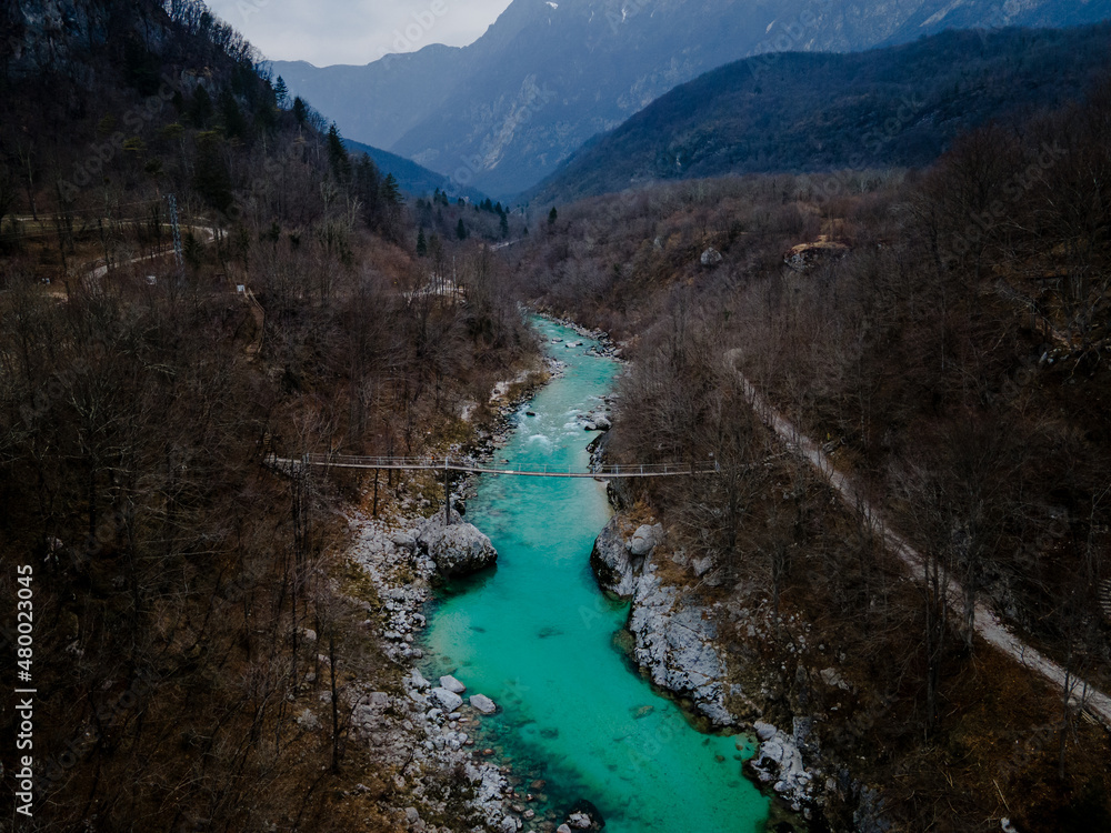 Fototapeta premium Landmark in Slovenia - turquoise Soca River, julian alps in the background