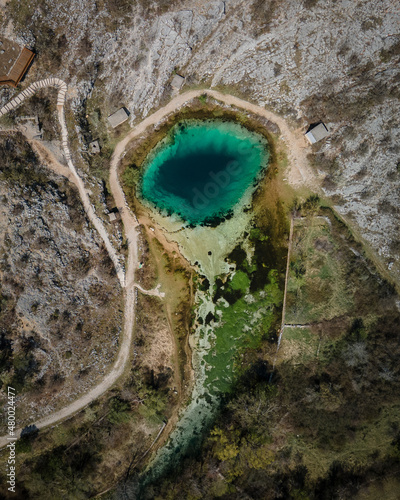 Izvor Cetine, spring of the Cetina river, also called blue eye (Modro oko). Dalmatia, Croatia. April, 2021. photo