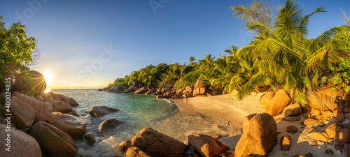 Fototapeta Naklejka Na Ścianę i Meble -  sunset at tropical beach anse lazio on praslin on the seychelles