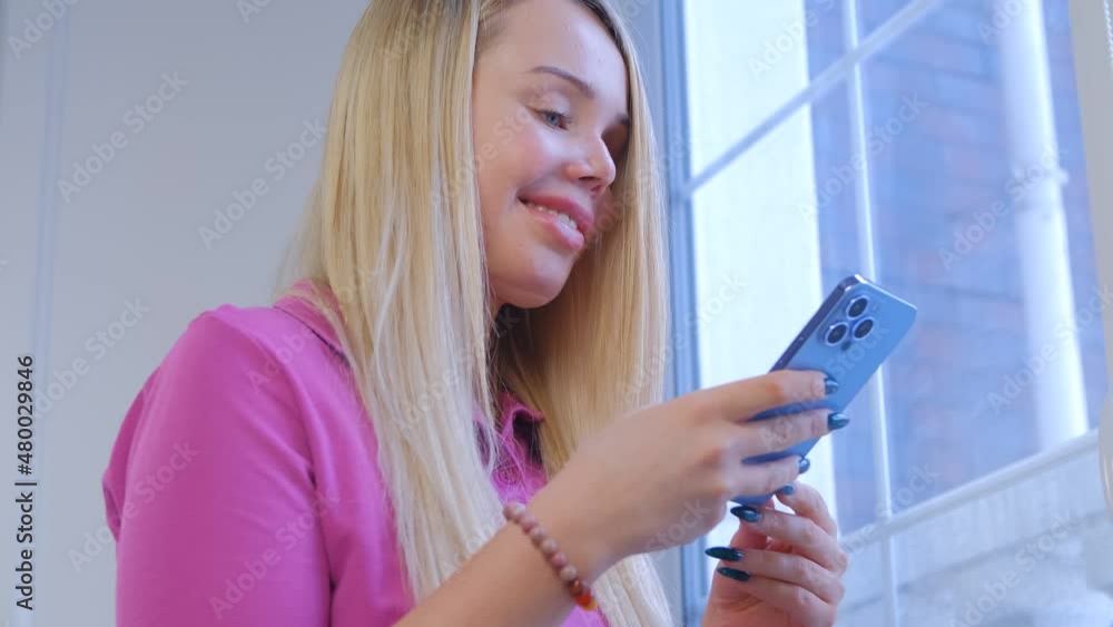 Home abuse survivor communicating online with modern mobile phone. Beautiful white woman with scars on face using social media app on smartphone for communication. Violence against women concept in 4k Home abuse survivor communicating online with modern mobile phone. Beautiful white woman with scars on face using social media app on smartphone for communication. Violence against women concept in 4k
