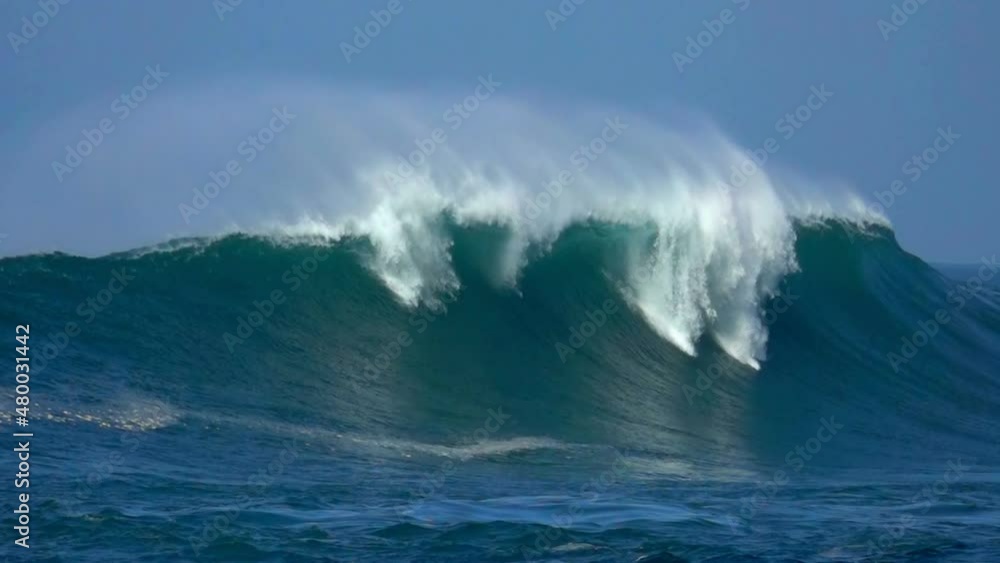 Ocean extreme wave, beautiful splash, sea-spray, blue sky Ocean extreme wave, beautiful splash, sea-spray, blue sky