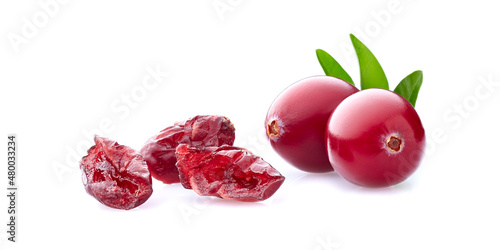 Fresh and dry cranberry with leaf on white background photo