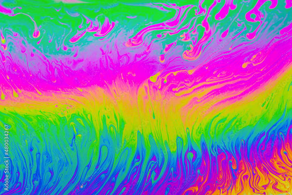 Psychedelic multicolored background abstract. Rainbow colors. patterns background. Photo macro shot of soap bubbles.