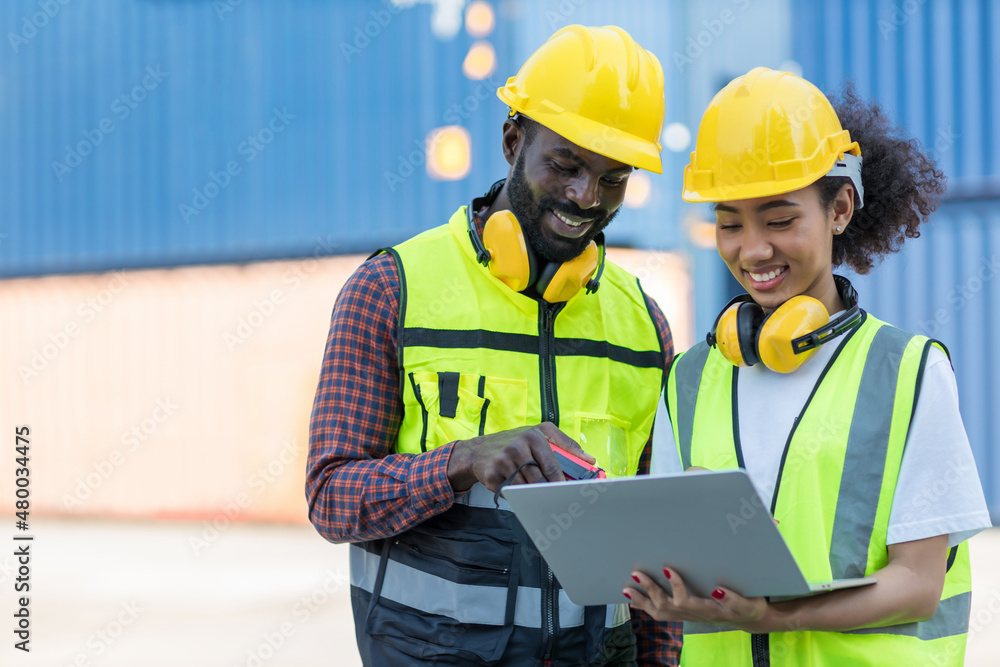 Foreman or worker work at Container cargo site check up goods in container. Foreman or worker checking on shipping containers. Logistics and shipping. Foreman or worker work at Container cargo site check up goods in container. Foreman or worker checking on shipping containers. Logistics and shipping.