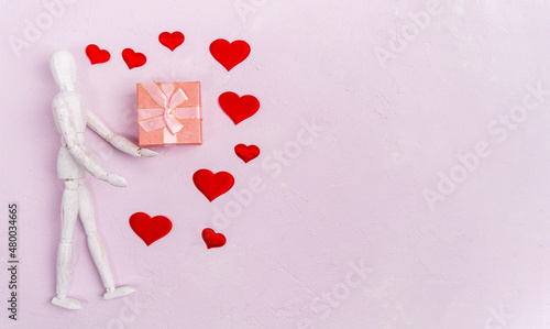 Gift and hearts with copy space. Valentines day concept. Copy space. Flat lay, top view. Copy space