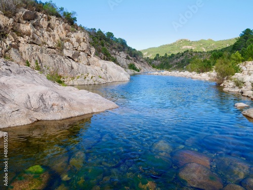 Big deep pool for swimming in river Solenzara at the foot of Bavella peaks in Southern Corsica, France.