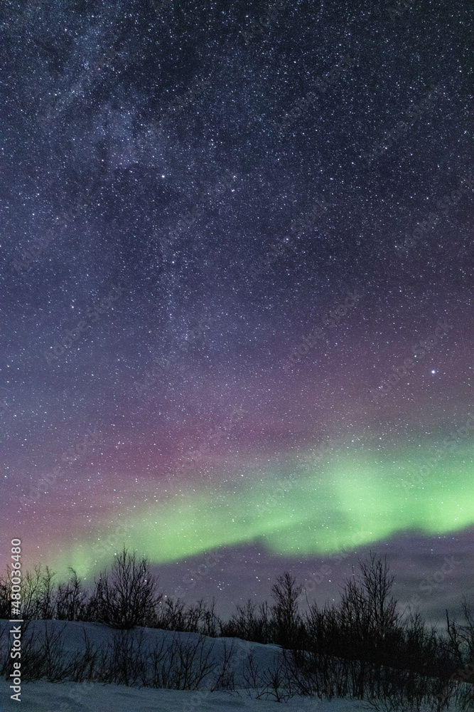 Soft Nothern Lights under the Milky Way. Taken in Swedish Lapland.