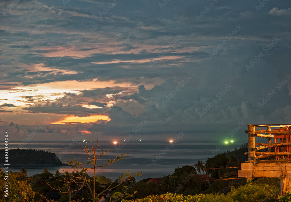 Fototapeta premium Tropical view at sunset over Andaman Sea at Phuket, Thailand.