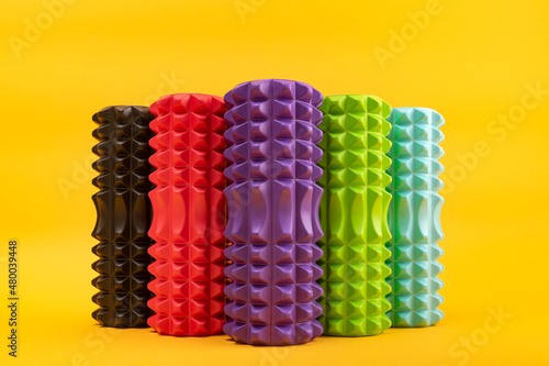 Multicolored rollers for massage. MFR roller relax. Fitness Equipment for self-massage. Front view