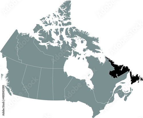 Black flat blank highlighted locator administrative map of the Canadian territory of NEWFOUNDLAND AND LABRADOR inside gray flat map of CANADA