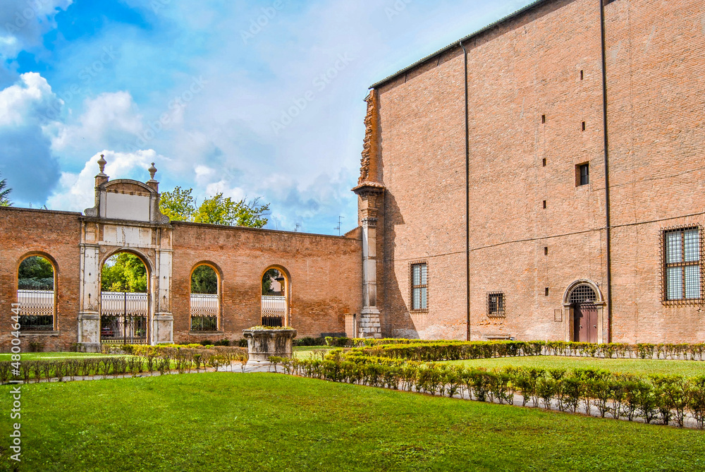 The courtyard and garden of Diamond Palace (Palazzo dei diamanti), Renaissance building built in the 15th century. Ferrara, Emilia Romagna region, Italy