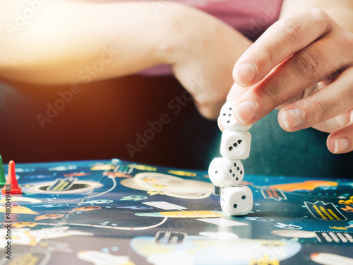 board games concept. Dice, chips and cards on the background of the playing field copy space