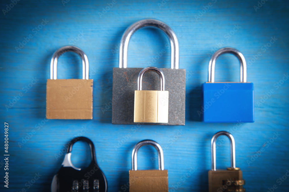 Different padlocks on the blue background. Different padlocks on the blue background.