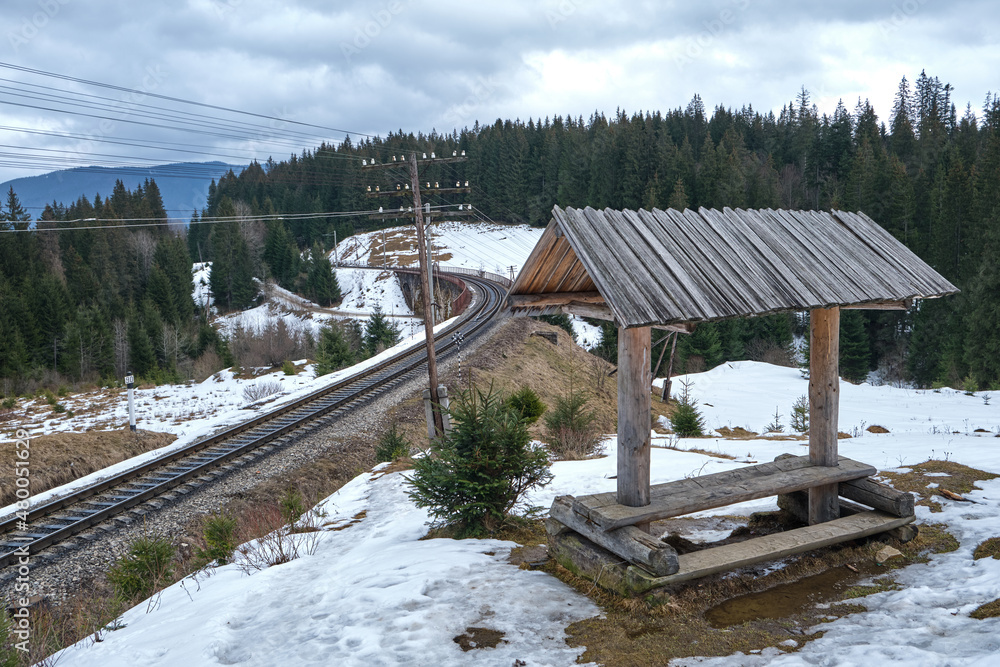 Mountain railway against the background of forest and mountains