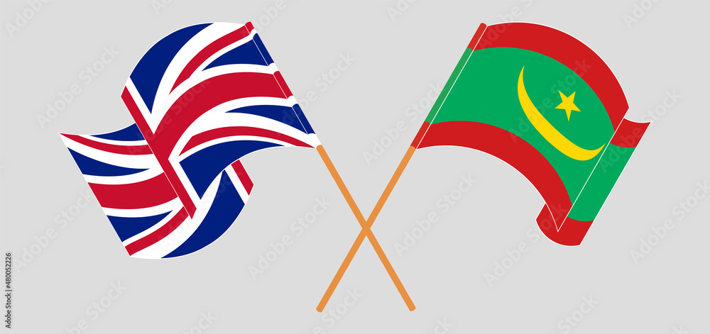 Crossed and waving flags of United Kingdom and Mauritania Crossed and waving flags of United Kingdom and Mauritania